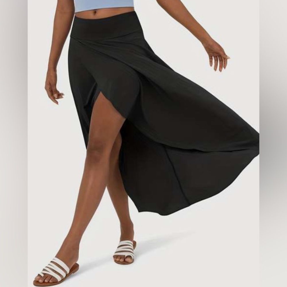 Black asymmetrical split hem midi skirt